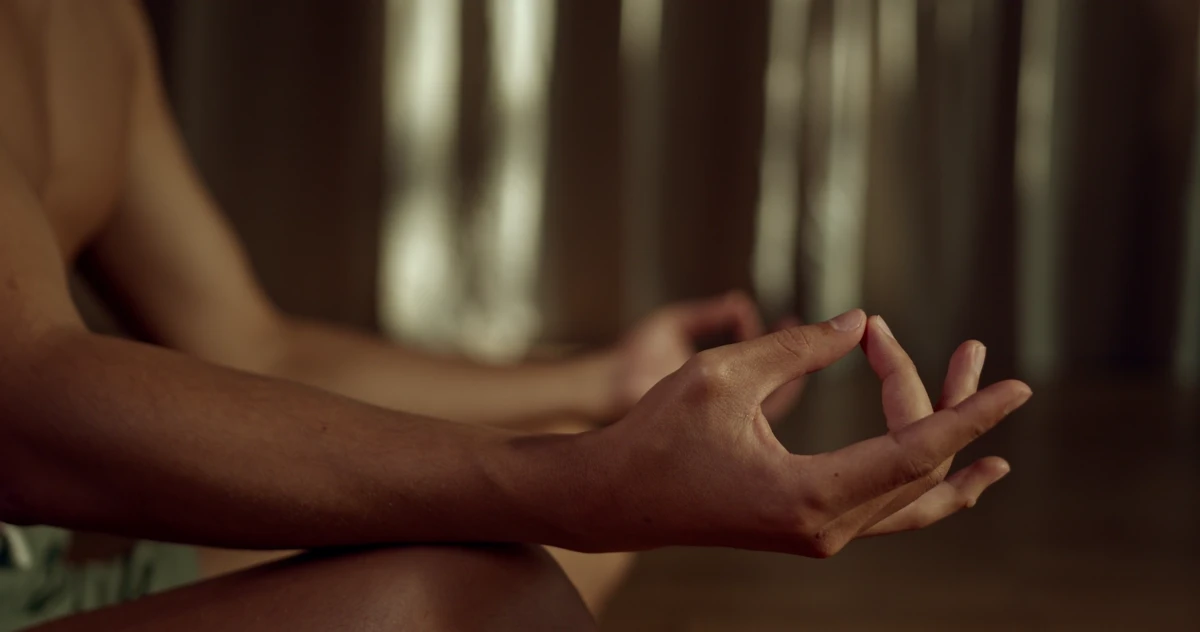 Hands resting in a meditation mudra