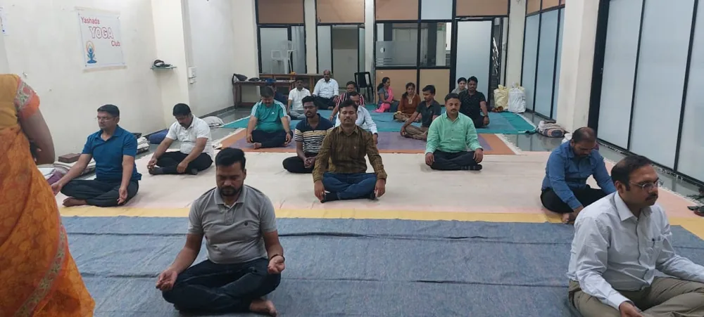 Students practising yoga together at the institute
